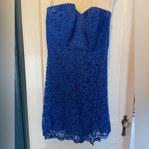 Royal blue lace strapless dress.